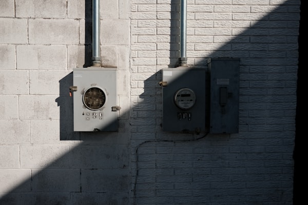 Residential electrical meters and transfer switch equipment on exterior wall